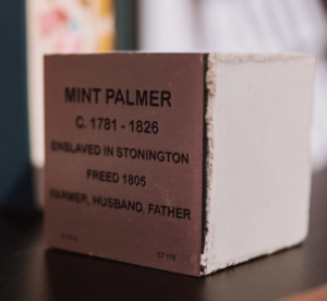Commemorative block honoring Mint Palmer, freed enslaved person, Stonington, 1781-1826, farmer, husband, father.