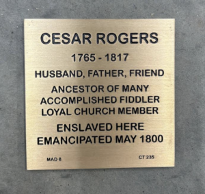 Memorial plaque for Cesar Rogers, honoring his life, accomplishments, and emancipation in May 1800.