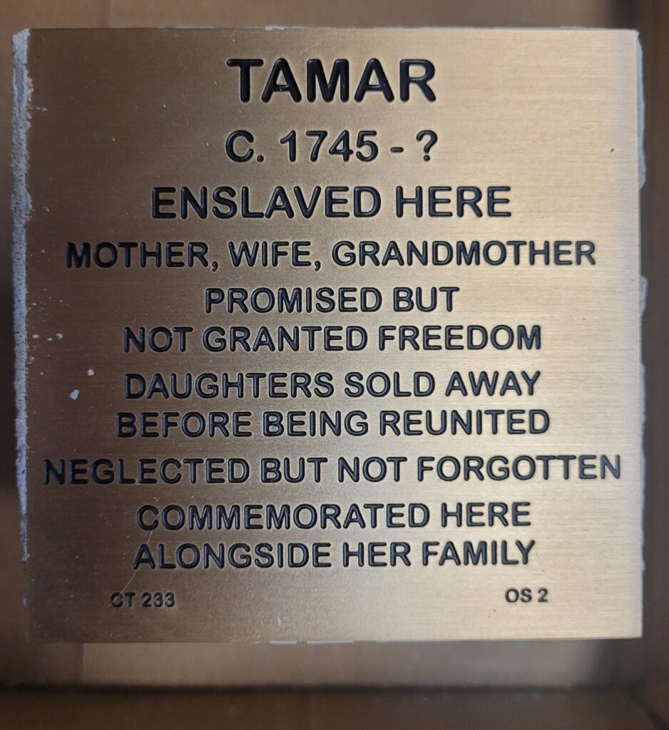 Commemorative plaque for Tamar, documenting her legacy as an enslaved mother and grandmother.