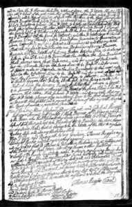 Handwritten legal document with intricate calligraphy, possibly a last will, featuring detailed clauses and signatures.