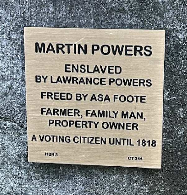 Plaque honoring Martin Powers: former enslaved person, farmer, family man, property owner, voting citizen until 1818.