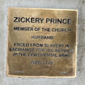 Bronze plaque honoring Zickery Prince, freed slave and Continental Army serviceman, died 1779. Member of the church.