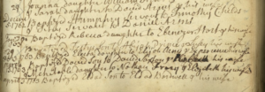 Old handwritten birth records from the 1700s showing family names, dates, and baptism details on aged paper.
