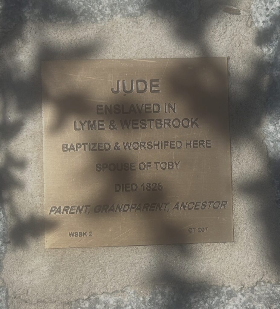 Bronze plaque honoring Jude, enslaved in Lyme & Westbrook, baptized, spouse of Toby, died 1826, ancestor.