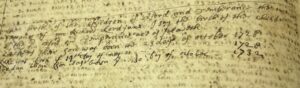 Aged handwritten text on parchment documenting historical records dated 1728, showing faded ink and antique script.
