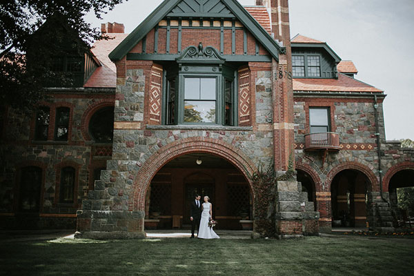 A bride and groom outside the Eustis Estate mansion